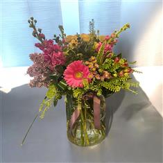 Hot pink and peach garden jar arrangement