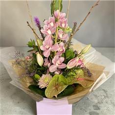 Pink orchid and anthurium luxury hand tied bouquet
