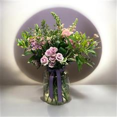 Soft pink and lilac garden jar arrangement